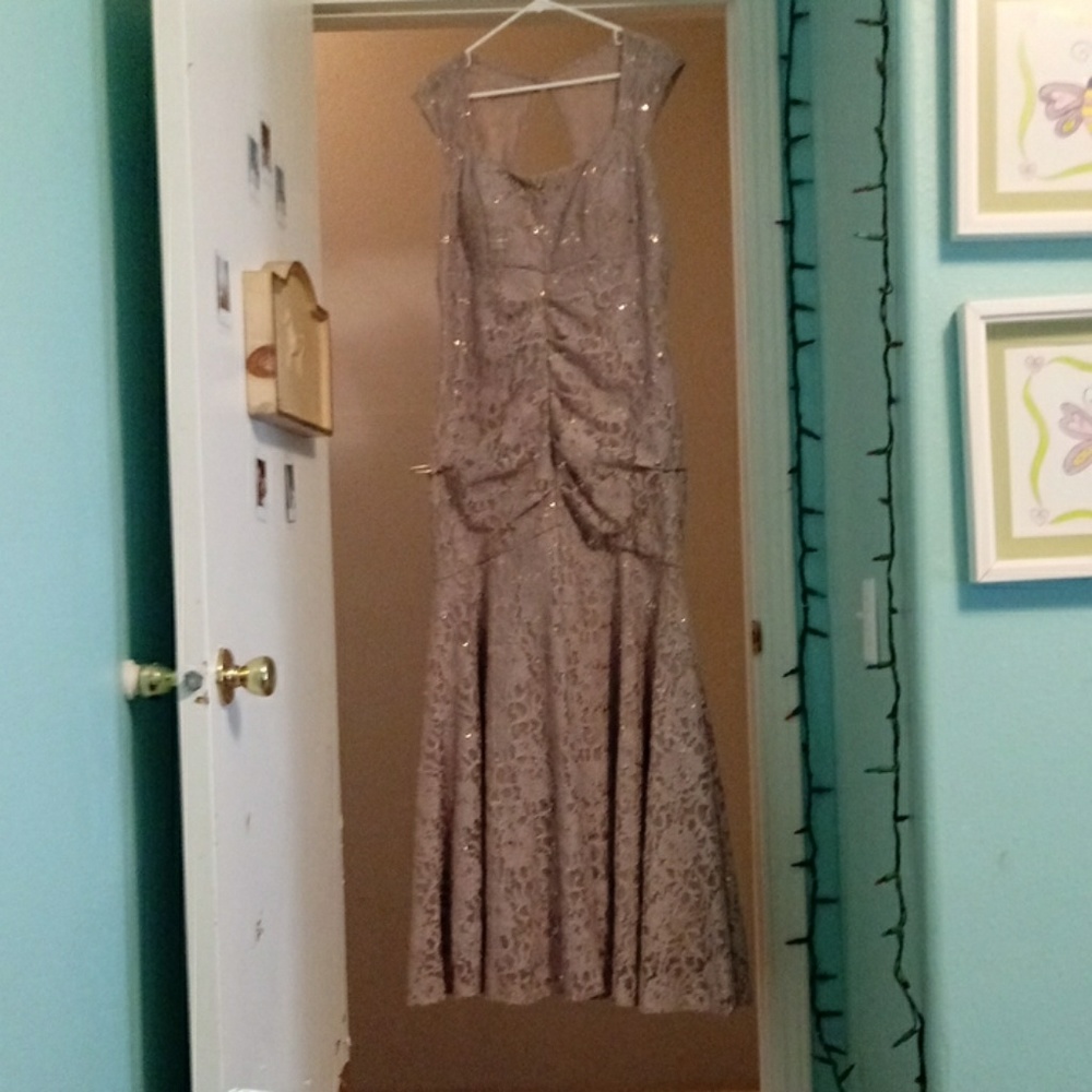 Pink/purple prom dress glitterful has a small slit